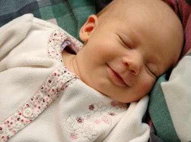 Why do babies smile sleep
